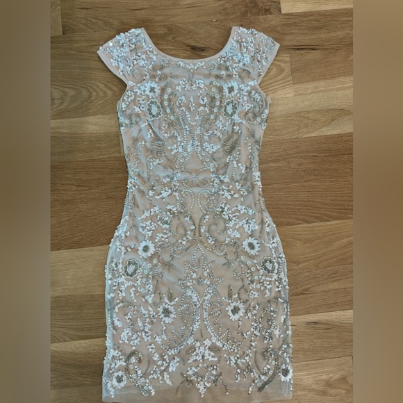 DB STUDIO
Short Cap Sleeve Dress with Allover Beading
STYLE# 141706350 - Picture 1 of 5